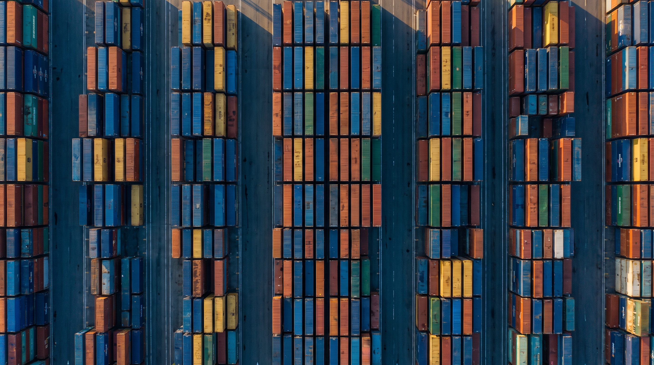Overhead view of a container yard at sunrise